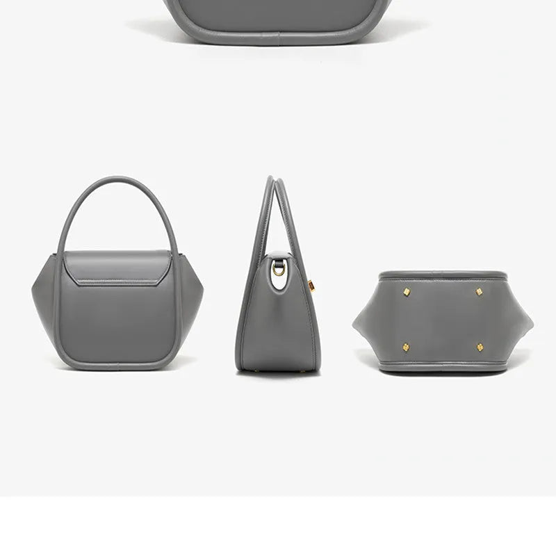 Leather wing bag with latch closure and buckle detailing in cow leather with cross-body strap