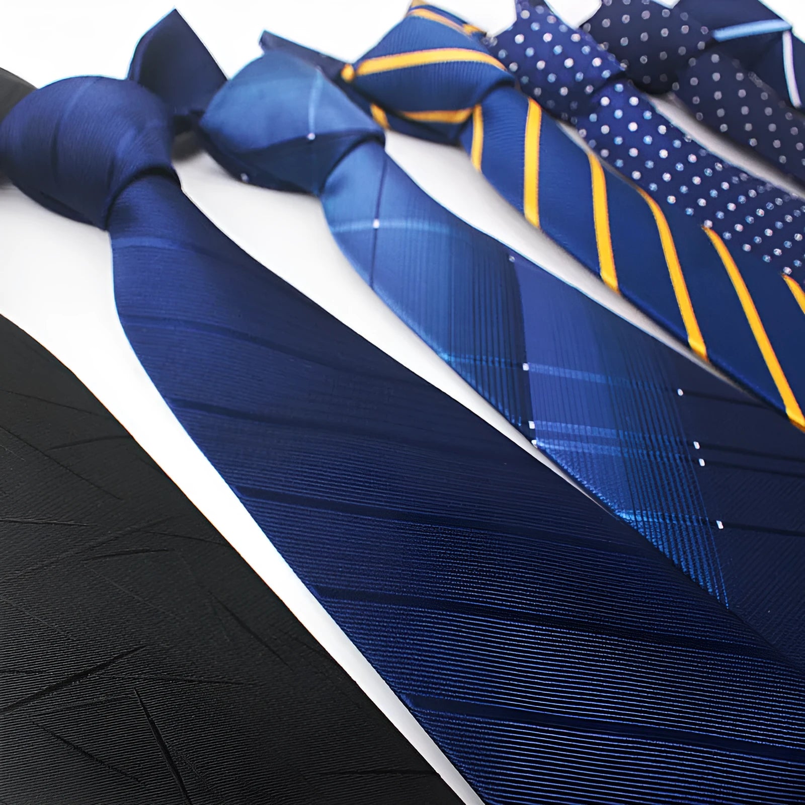 8CM wide polyester jacquard striped business tie in arrow style showing red, black, and blue colour options