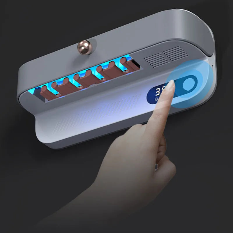 White wall-mounted smart toothbrush steriliser holder with UV light and space for 6 toothbrushes