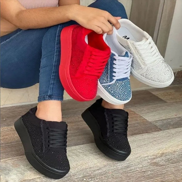 Plus size women's black casual sports shoes with rhinestones on the upper and flat chunky rubber soles.