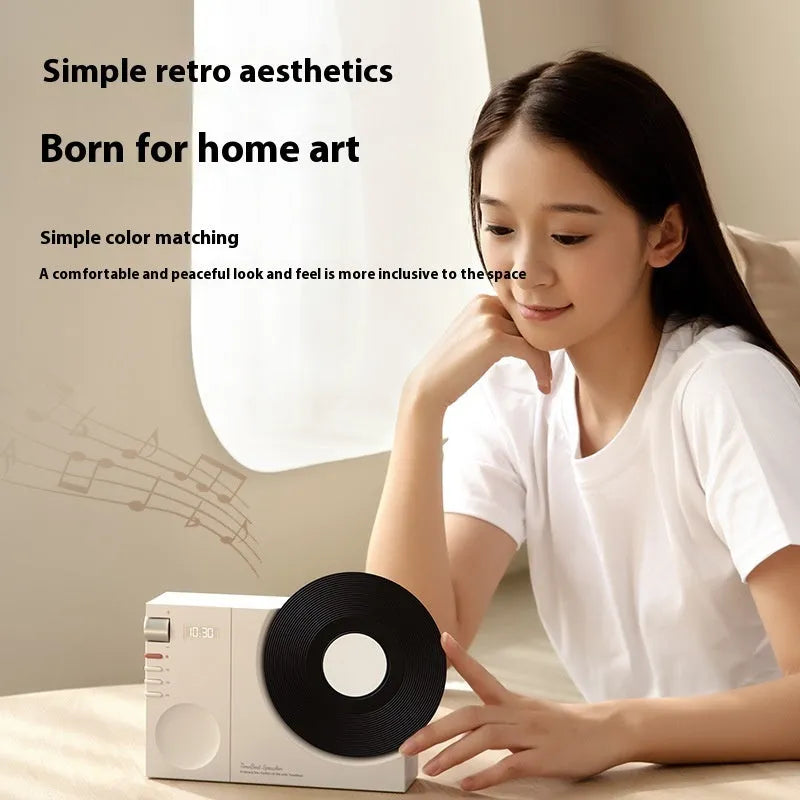 Mini Bluetooth portable speaker in Obsidian Black colour showing compact design with control buttons and card slot