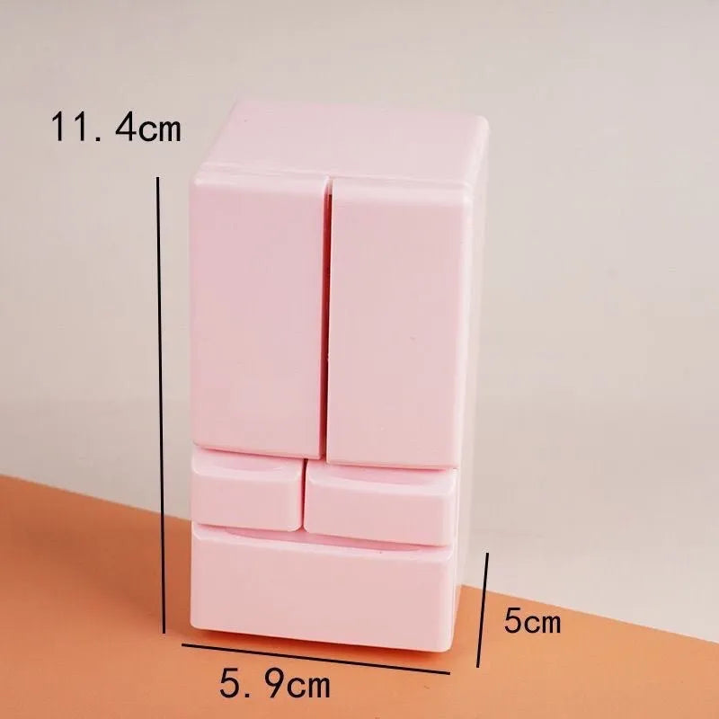 White plastic miniature candy toy model with light-up feature, shown next to a ruler indicating 11.4cm height.