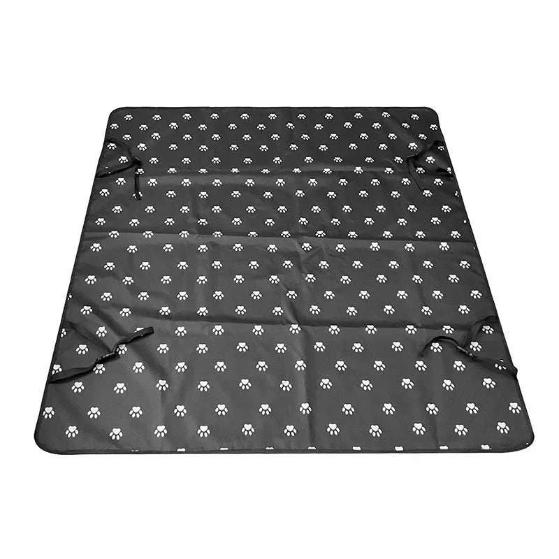 Washable cloth car pet mat for rear seat protection with dog bone print design.
