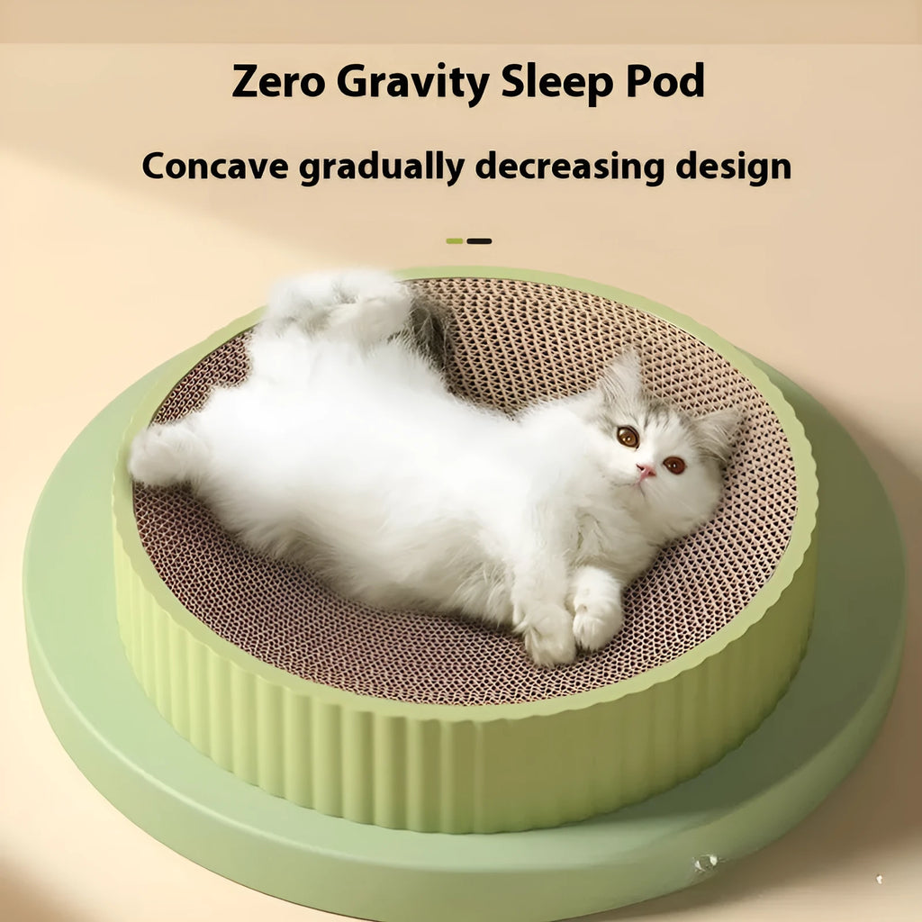 Round green cat scratching board with corrugated cardboard centre measuring 55cm diameter
