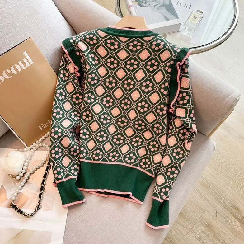Green women's printed sweater with a loose fit and regular sleeves for casual commuting wear.