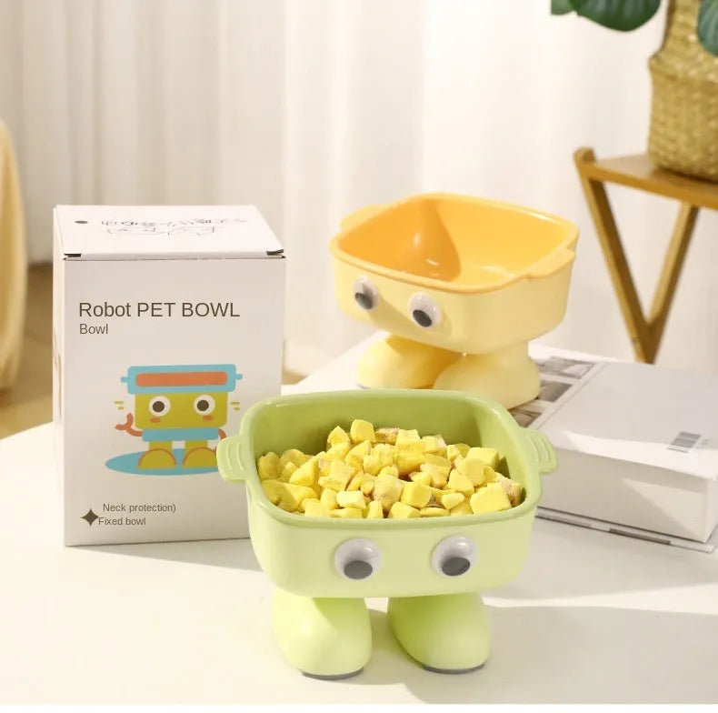 Green robot-shaped elevated cat bowl with tilted design and detachable inner dish