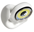 White Atomic Angel induction light unit on a surface showing its compact size.