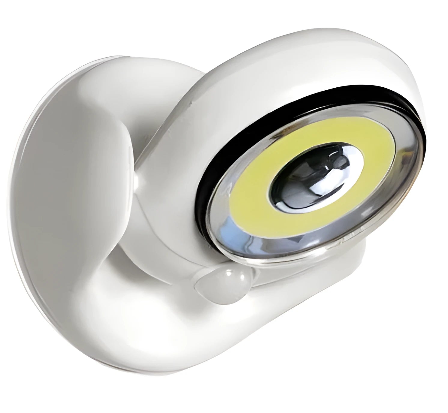 White Atomic Angel induction light unit on a surface showing its compact size.