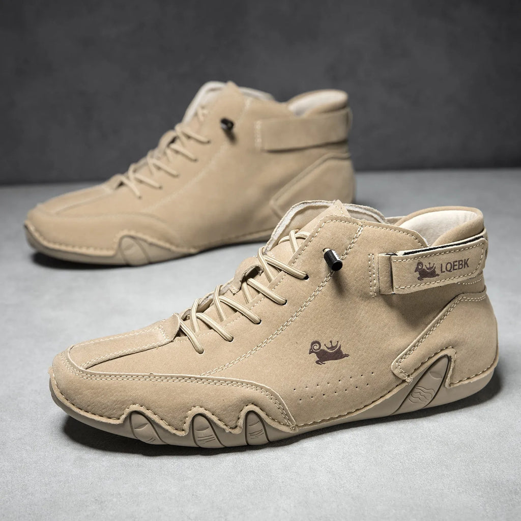 Men's brown high-top octopus Martin boots with a round toe and visible stitching on a flat rubber sole.