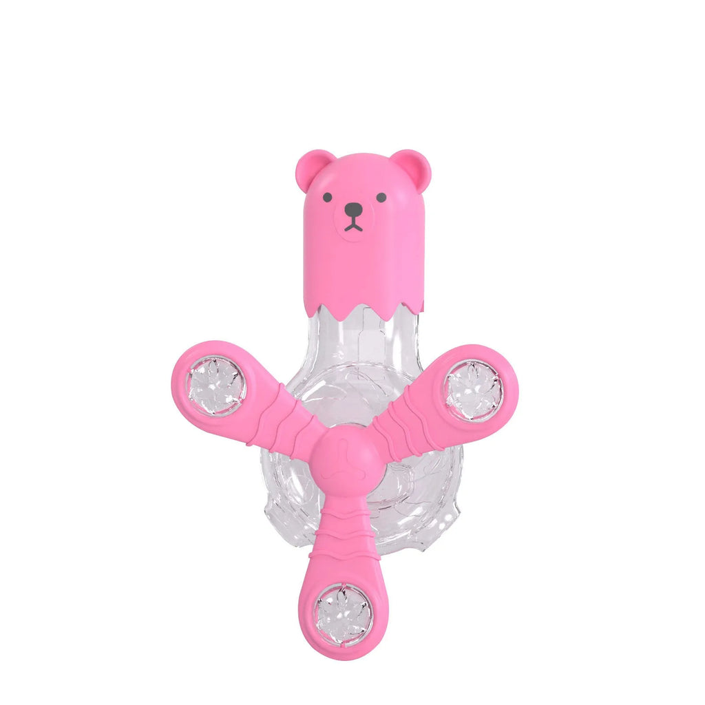 Interactive cat toy with light sound rotation and leak function in blue pink yellow off-white on floor