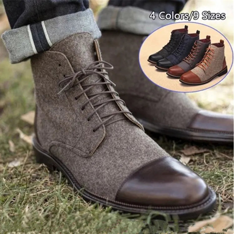 Men's black leather motorcycle boots with metal belt buckle details on a rubber sole.