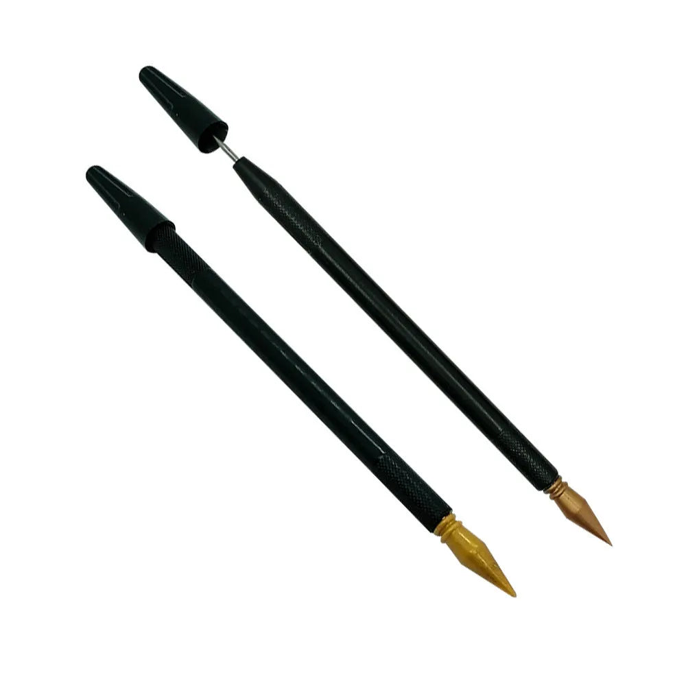 A white scratch art pen tool for children's crafts on scratch paper.