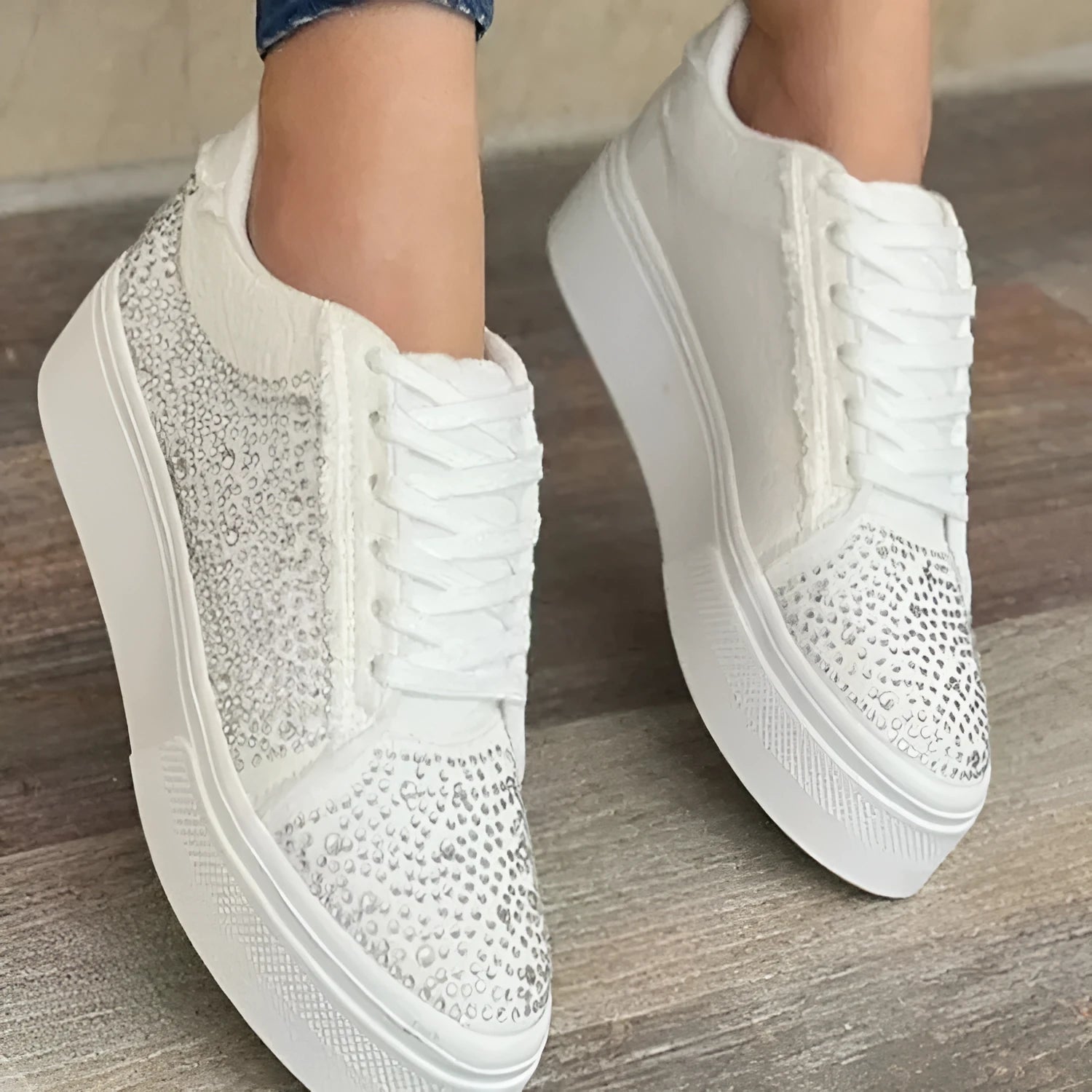 Plus size women's black casual sports shoes with rhinestones on the upper and flat chunky rubber soles.