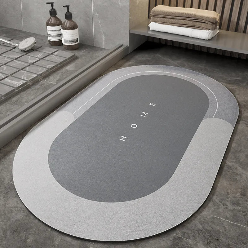 Blended fabric bathroom floor mat in oval and rectangular shapes on a tiled floor.