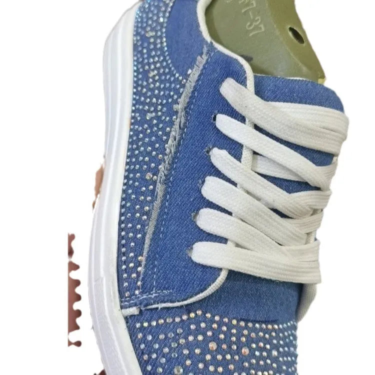 Plus size women's black casual sports shoes with rhinestones on the upper and flat chunky rubber soles.