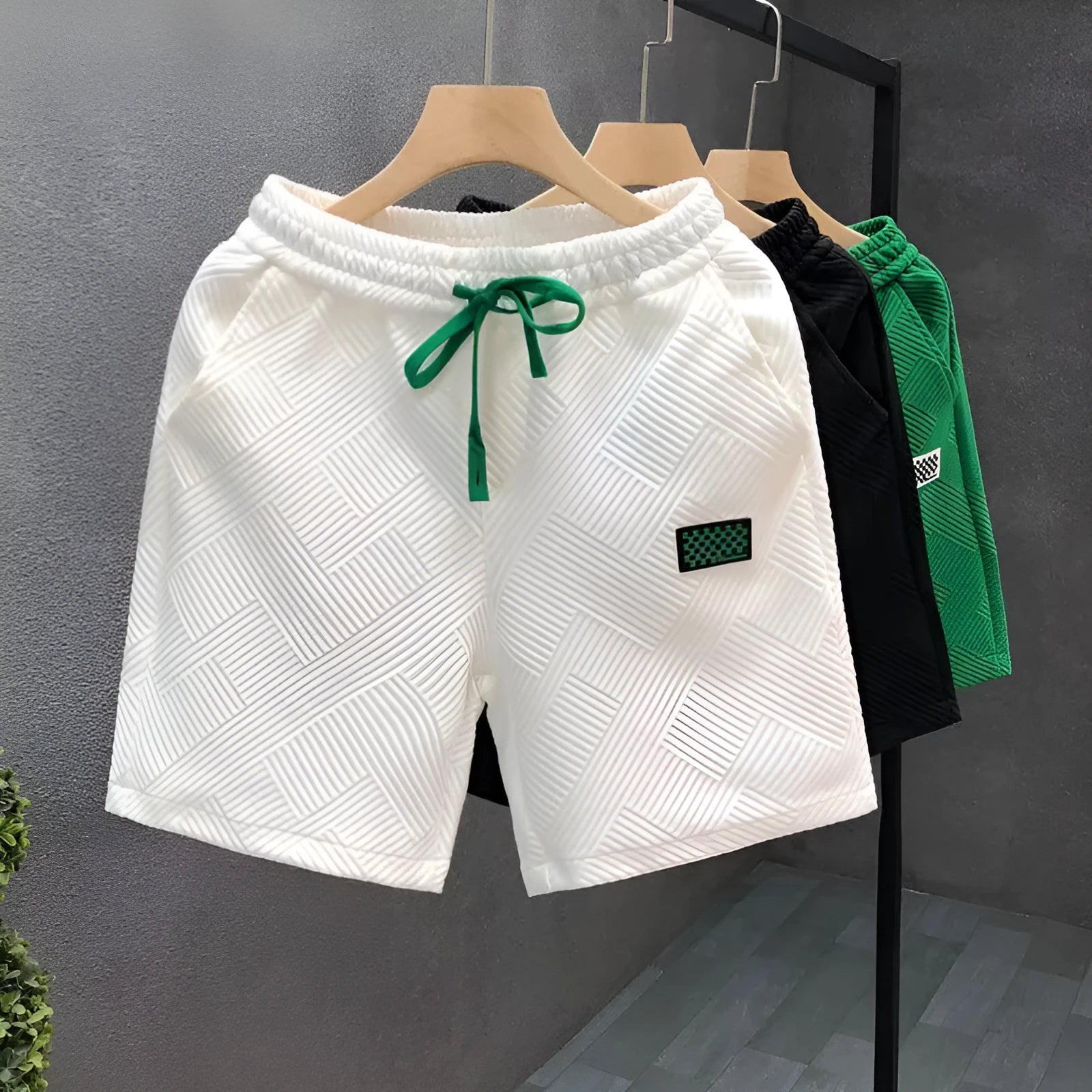 Men's casual sports shorts in black, green, or white with American style cut and micro-elastic polyester fabric