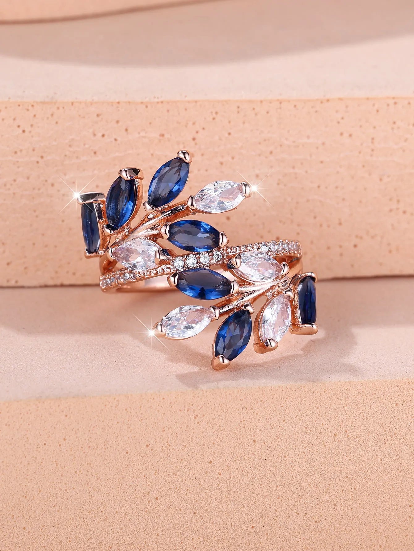 Adjustable copper leaf ring with a horse eye zircon stone in a choice of nine colour finishes.