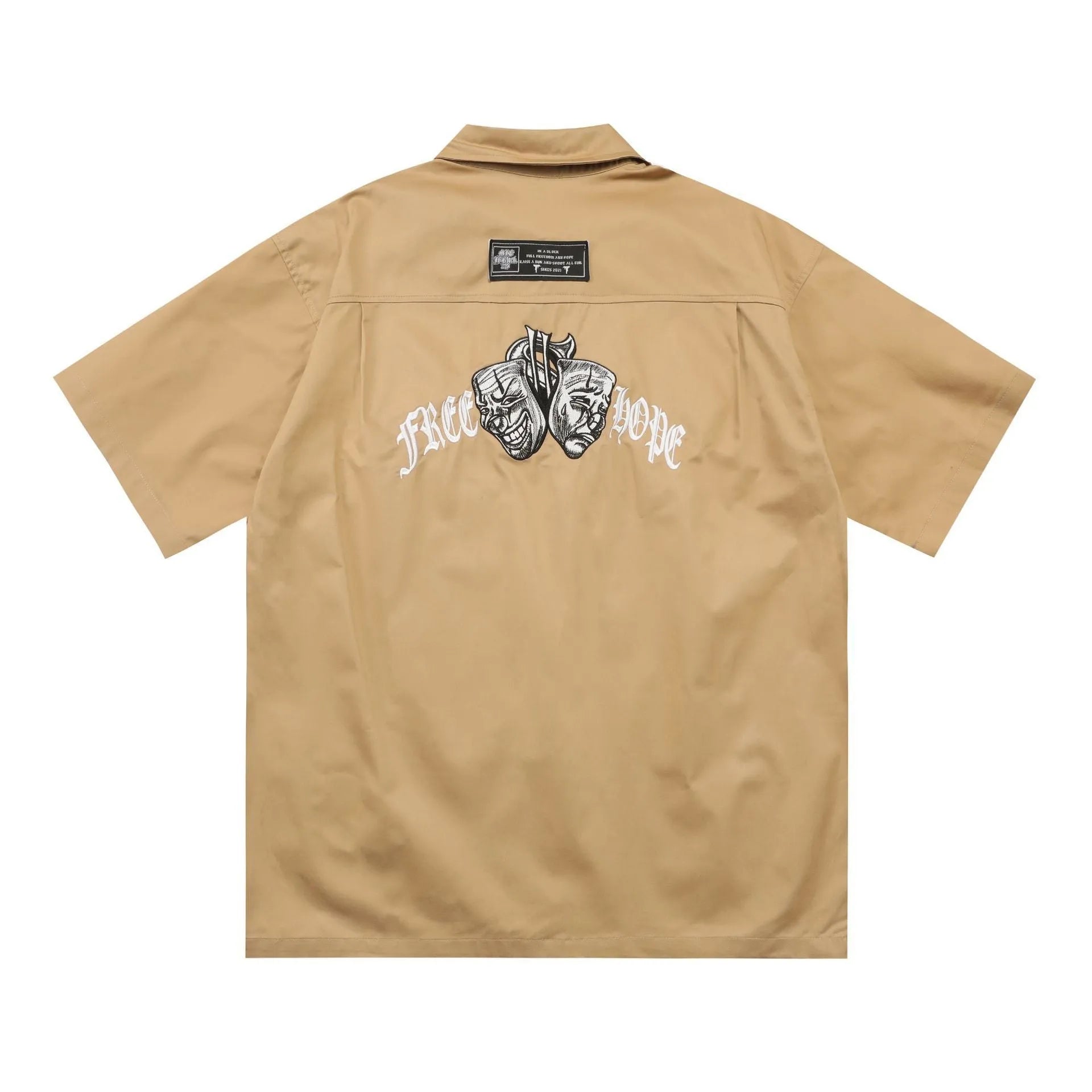 Men's black loose fit cotton blend pocket shirt with half sleeves and embroidered detail on a hanger.