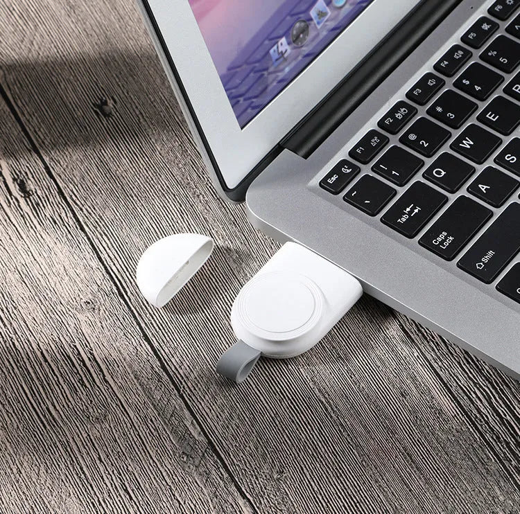 Portable wireless charger dock for Apple Watch in white, with USB cable and compact ABS body
