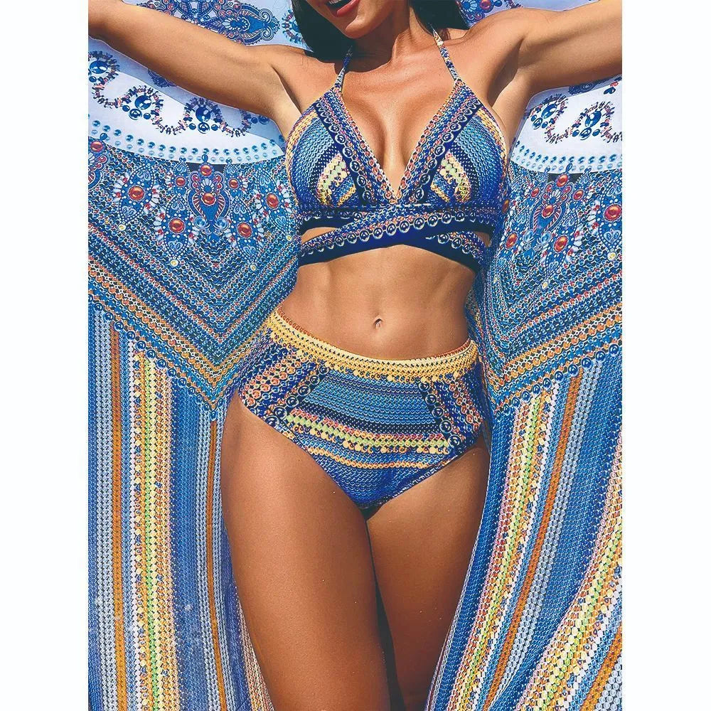 Women's blue three-piece bikini swimsuit with cross bandage bra, high waist briefs and veils split smock