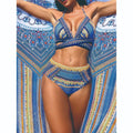 Women's blue three-piece bikini swimsuit with cross bandage bra, high waist briefs and veils split smock