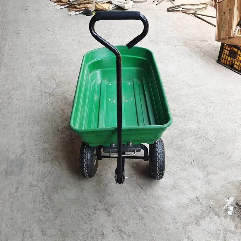 Green four-wheel plastic dumptruck with tipping bed, model TC2145.