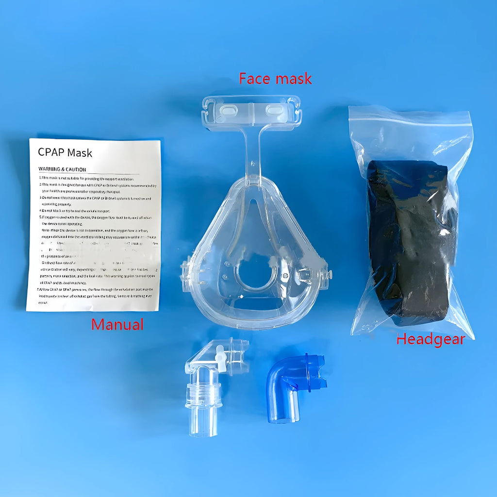Transparent CPAP breathing mask with silicone cushion, headgear and two rotary elbows for ventilator connection