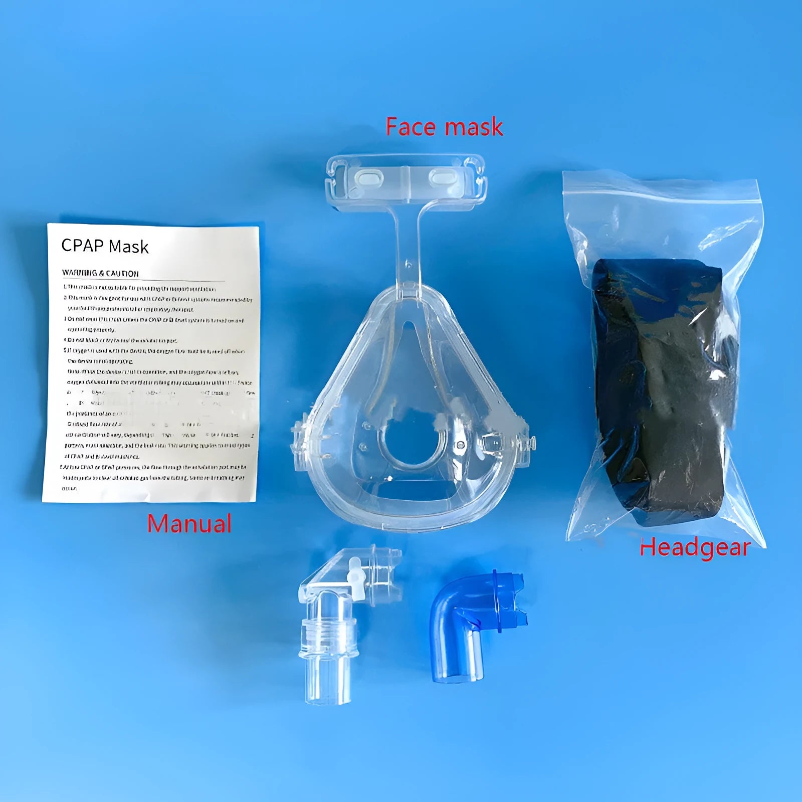 Transparent CPAP breathing mask with silicone cushion, headgear and two rotary elbows for ventilator connection