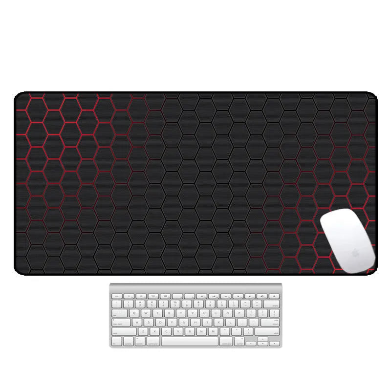 Large thermal transfer printed mouse pad with natural rubber non-slip base on a desk.