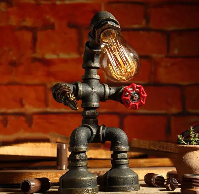 Robot vintage industrial table lamp with iron pipe construction in green bronze finish