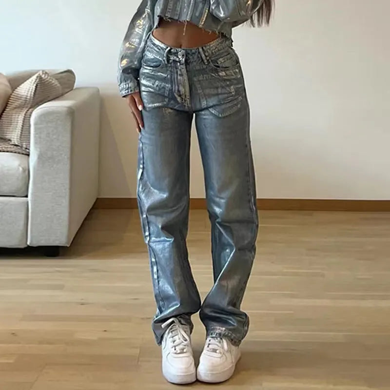 Women's washed blue high waist straight leg denim jeans with street hipster styling and contrast colour details
