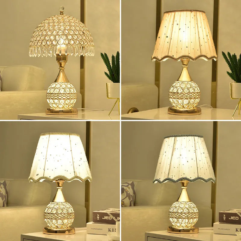 Gold crystal desk lamp with iron art base on a wooden table