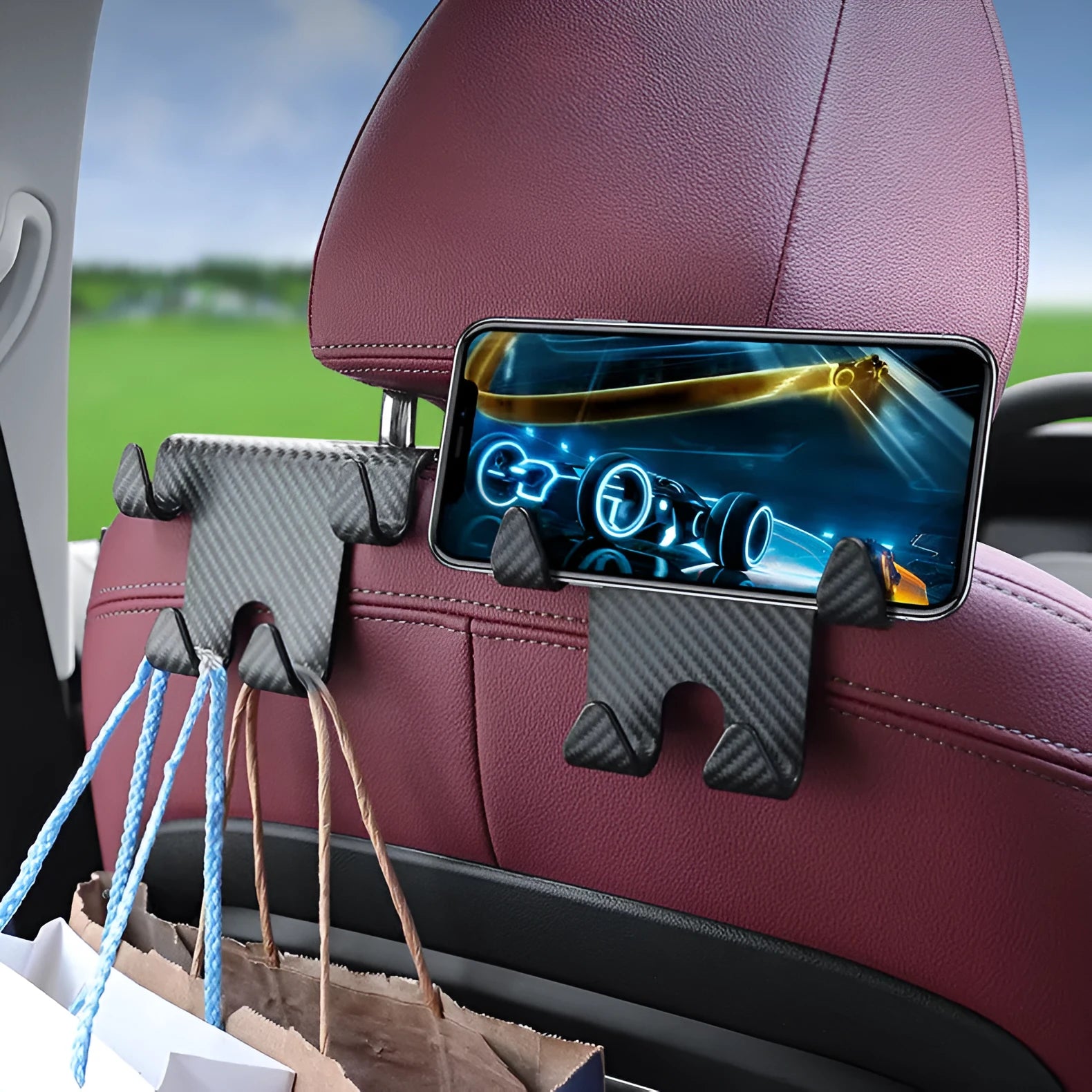 Black ABS plastic car hook and mobile phone holder for rear seat back storage.