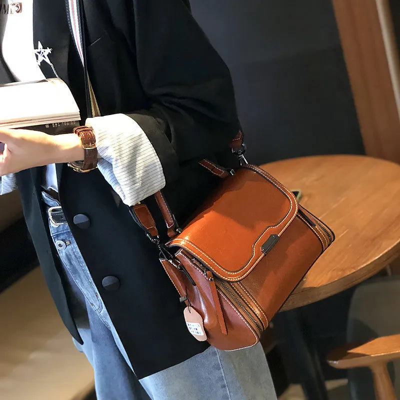 Genuine leather women's messenger bag in horizontal square shape with multiple pockets and double shoulder straps