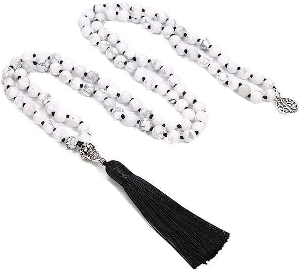 Handmade knotted beaded necklace with stone pendant showing 108 beads and geometric design
