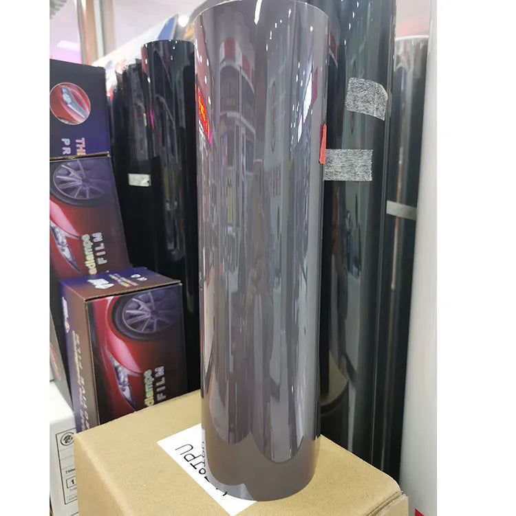 30cm wide plastic car lamp protective film on LED headlight showing transparent protection