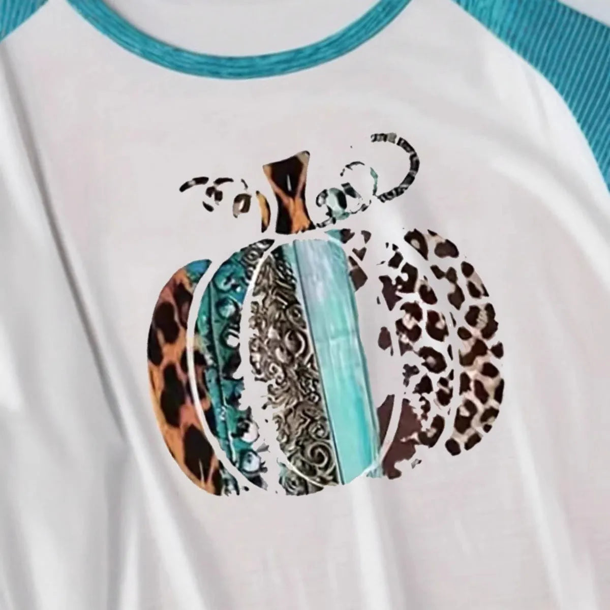 White Halloween T-shirt with 3D printed pumpkin graphic in sky blue, long sleeves