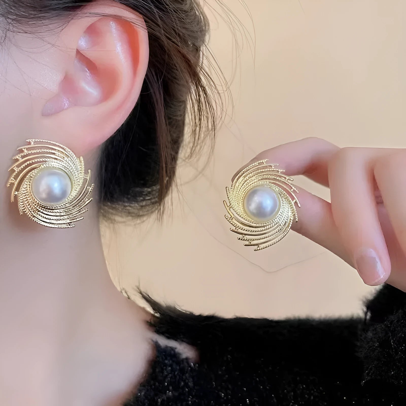 Gold plated pearl earrings with irregular flower shape design on alloy stud backs