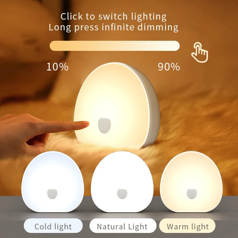 White rechargeable baby night feeding comforter sleeper unit with music function.