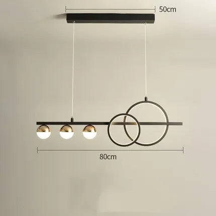 Modern rectangular aluminium ceiling light in black finish with remote control on a white ceiling.