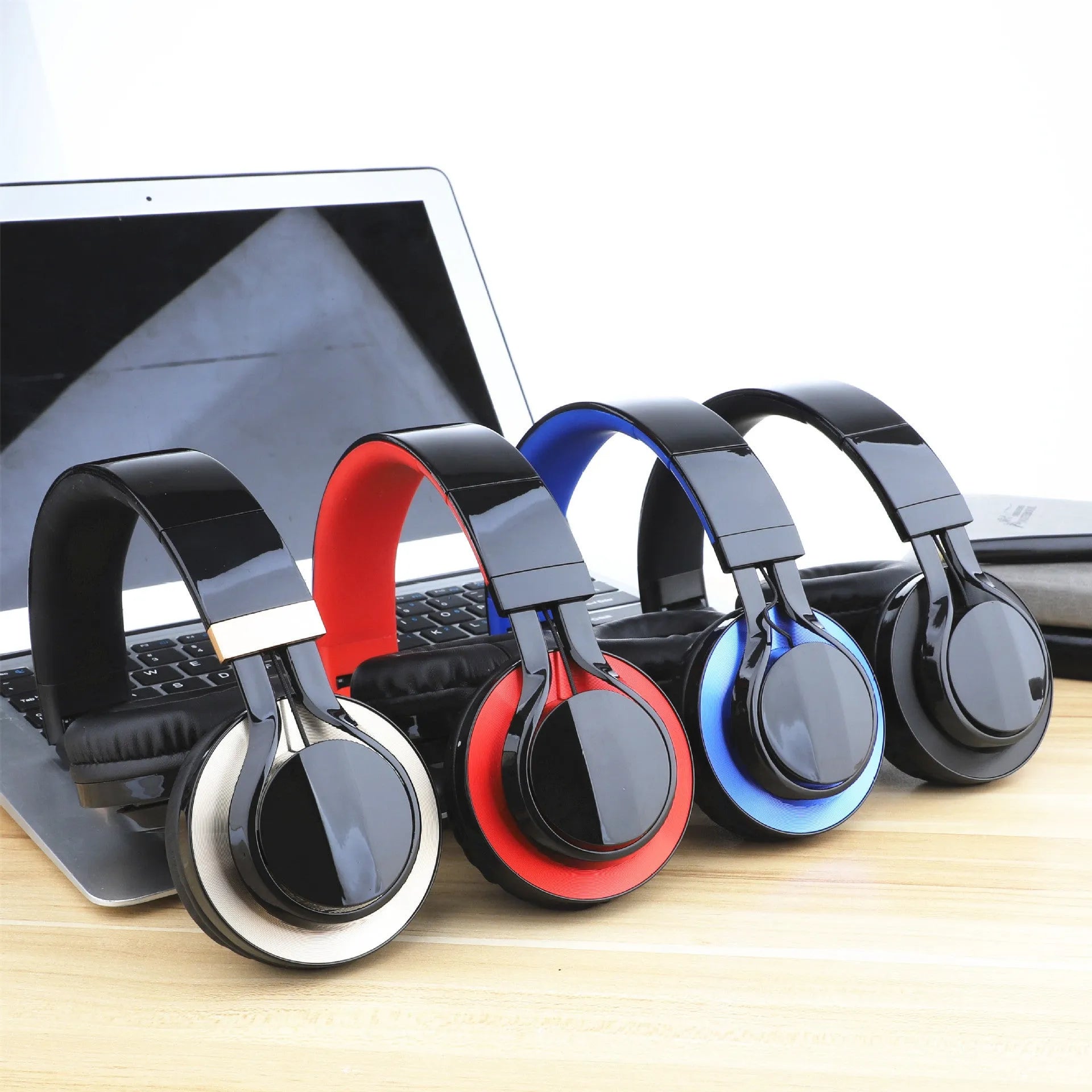 Black wired headphones with microphone showing 3.5mm plug and 40mm ear cups