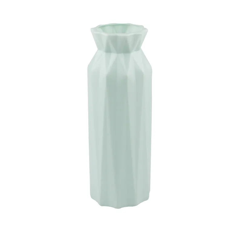 Green drop-resistant melamine vase with a 7.2cm base on a wooden table.
