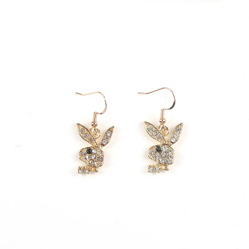 Alloy full diamond rabbit character stud earrings in silver, gold, or pink colour.