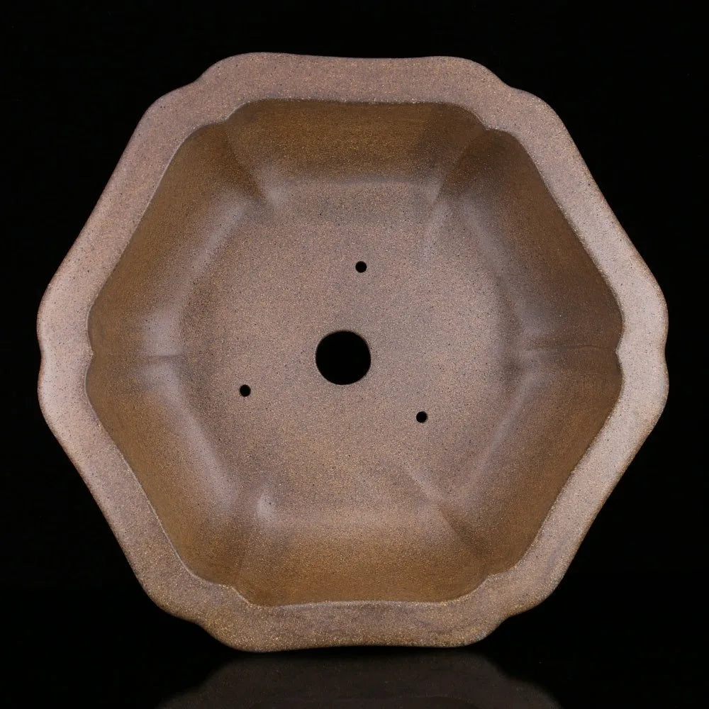 Handmade large purple sand clay plant pot in hexagonal or begonia basin style.