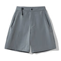 Men's quick-drying sports shorts in Army Green colour on a grey background.