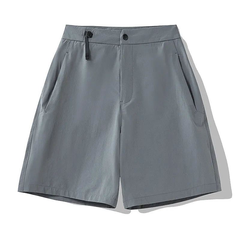 Men's quick-drying sports shorts in Army Green colour on a grey background.