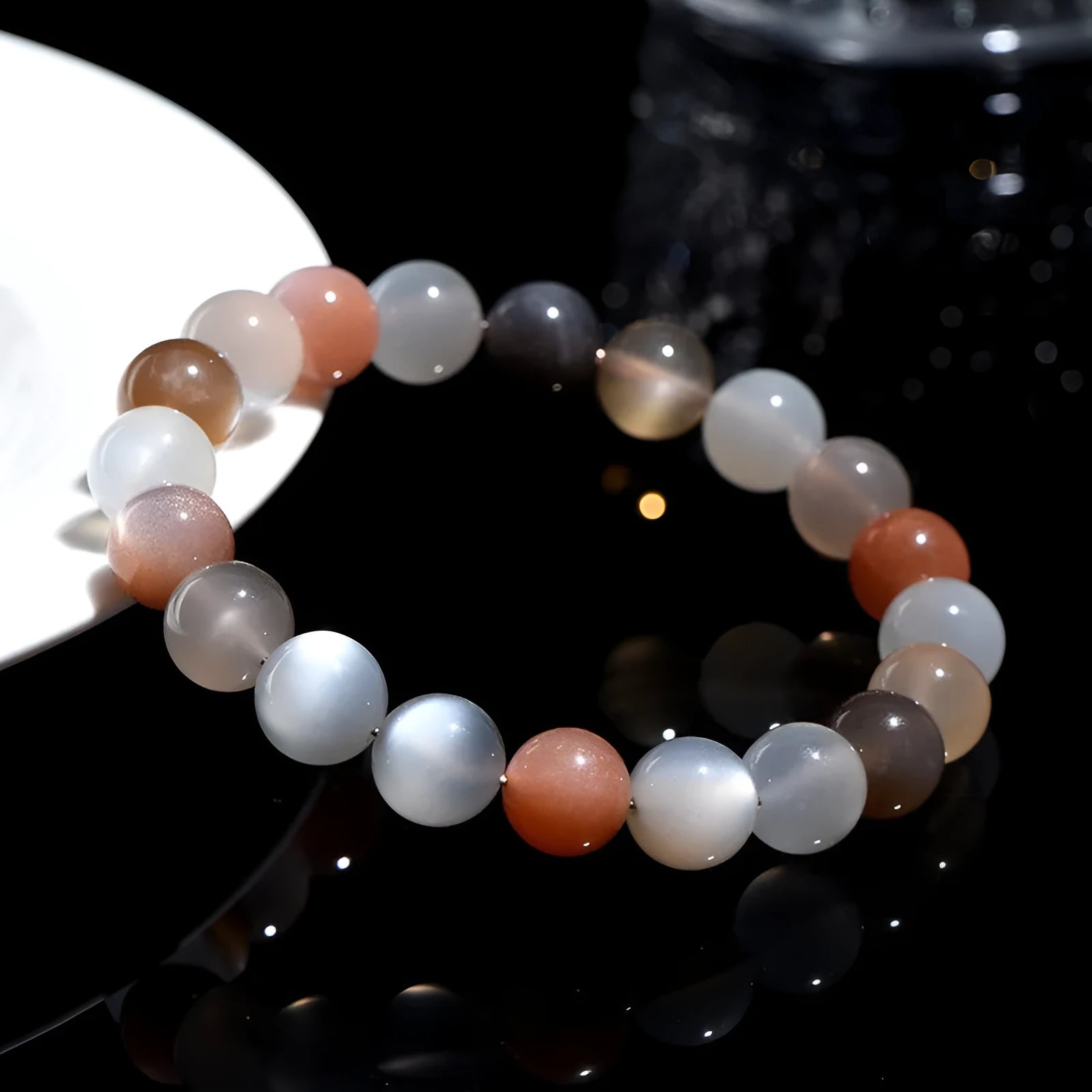 Natural moonstone colourful moonlight bracelet with 8mm beads in a single circle on a wrist.