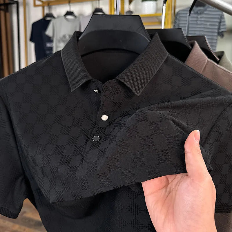 Thin Ice Silk blend short sleeve T-shirt in black with a V-neck and slit hem detail on a hanger.