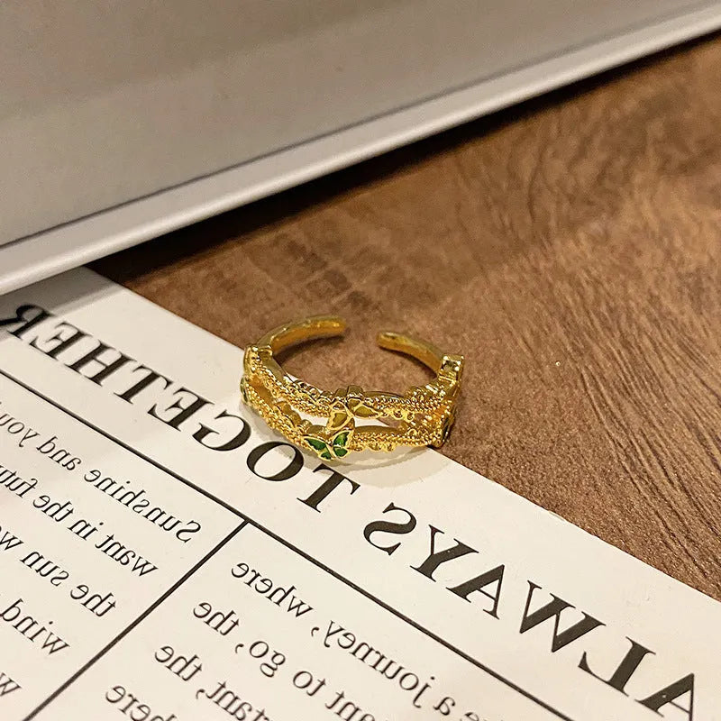 Copper Chinese butterfly women's ring showing creative design with oil dripping treatment finish