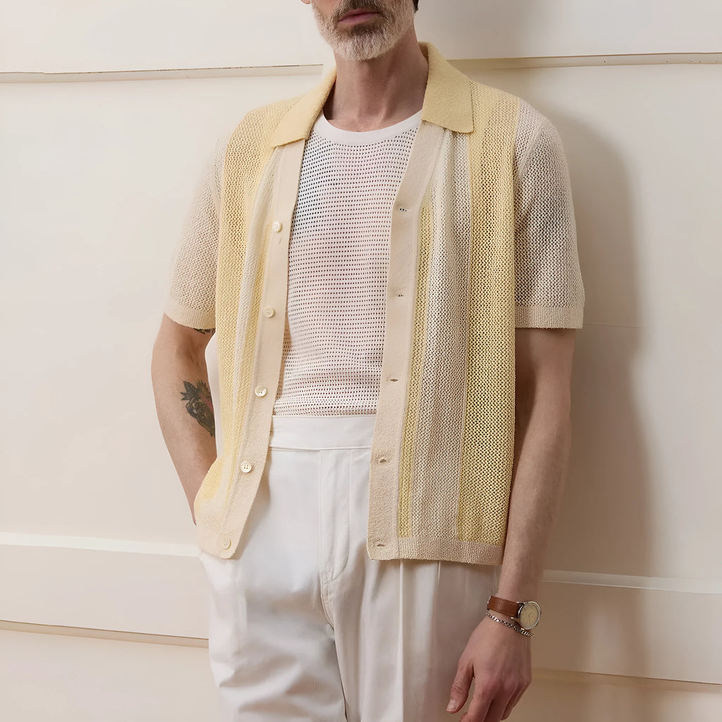 Yellow short-sleeved polo shirt with hollow-out asymmetric design detail on Tencel fabric